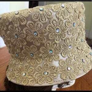 Flower detailed gold hat